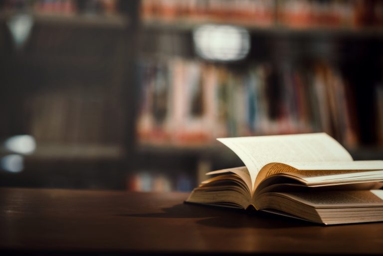 Book Library With Open Textbook 768x513